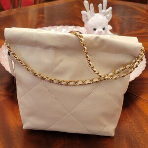 New! Never used cute crossbody "slouchy style" fashion bag. White/gold